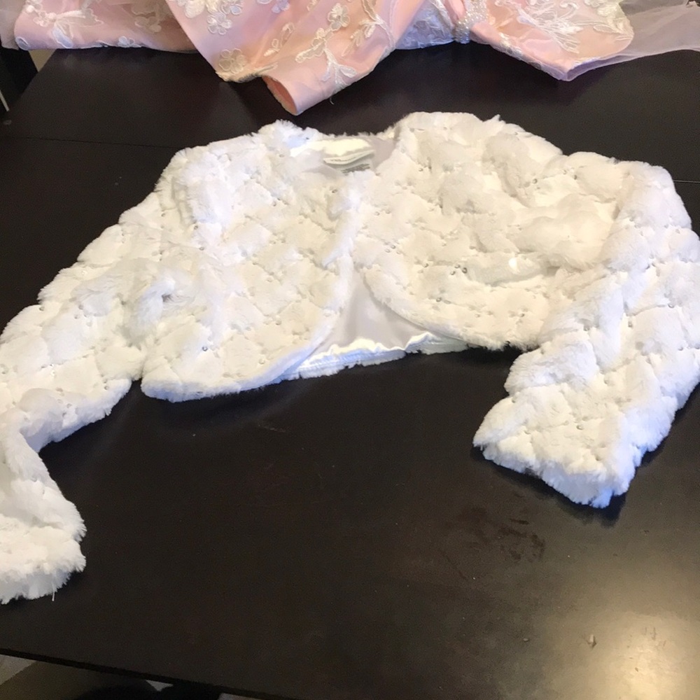 Sequined Faux fur shrug.